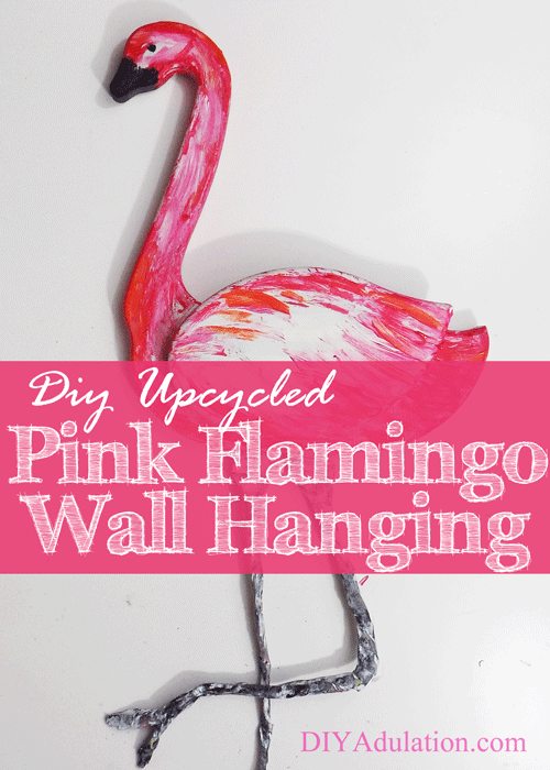 See the newest makeover at the Thrift Store Decor Upcycle Challenge! Turn an ugly thrift store goose into an awesome pink flamingo wall hanging.