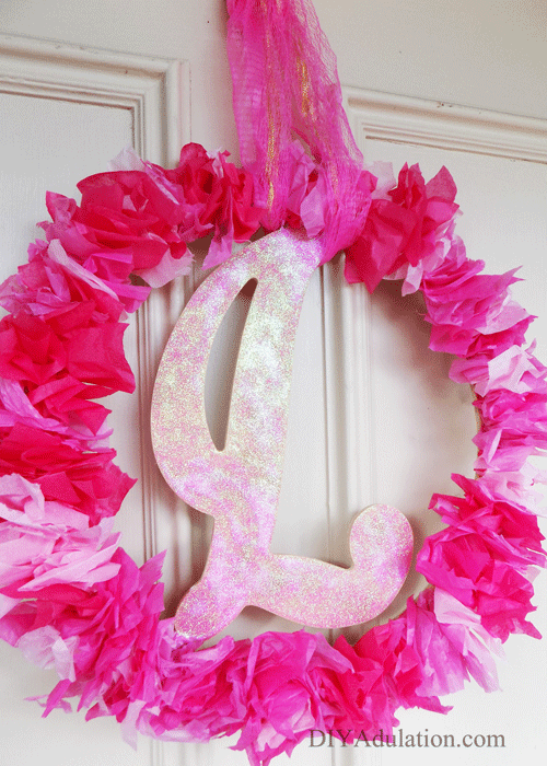 If your Valentine’s style this year is loving all things pink and sparkly then this DIY monogram Valentine wreath is perfect.