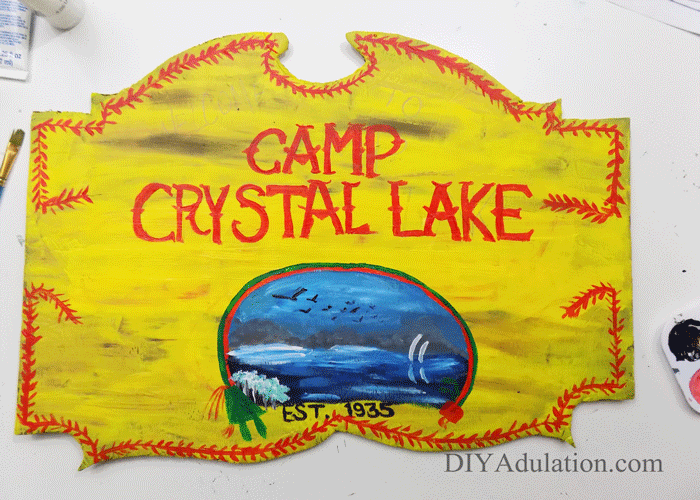 Friday the 13th is an iconic, cult horror film! Pay homage to this classic film by making this DIY Camp Crystal Lake sign for Halloween!