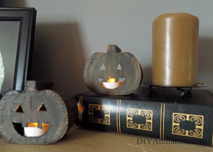 These easy DIY mini pumpkin lanterns are the perfect little addition to your fall mantle or bookshelves this season. Find out how to make them now!