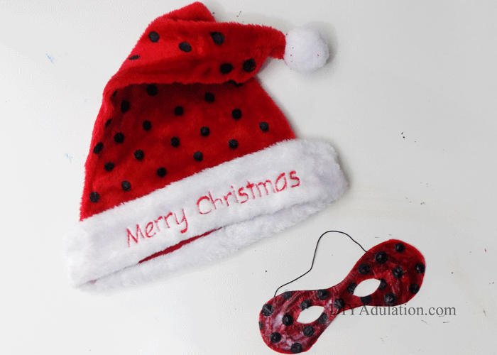 Do your kids love Ladybug and Cat Noir? Watch your kid transform into a Christmas crime fighter with this DIY Miraculous Ladybug Santa hat and mask.