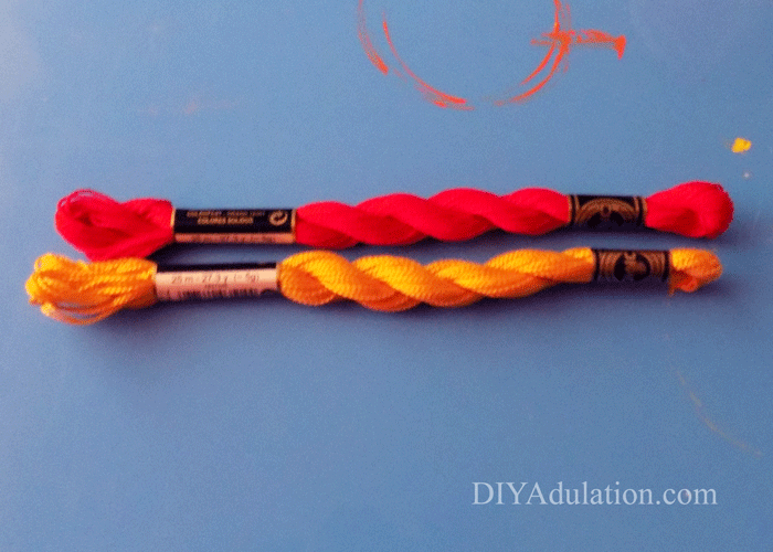 Red and Yellow DMC floss