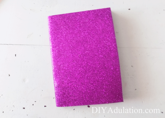 Purple glitter notebook