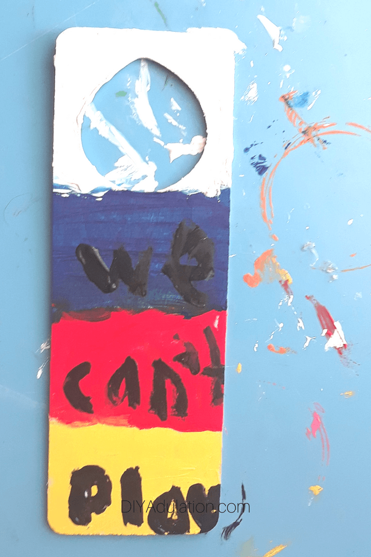 We Cant Play Painted on Door Hanger