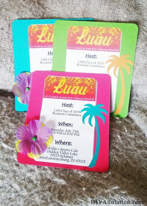 Teal, Pink, and Green Luau Invitations on Gray Background