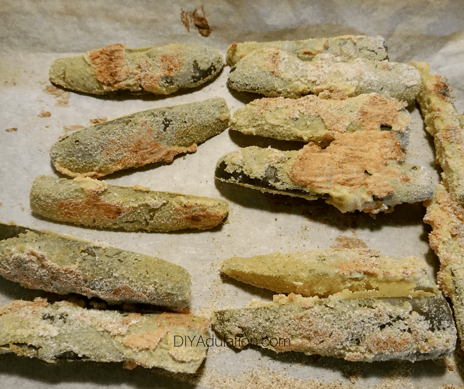 Baked Pickle Spears on Parchment Lined Tray
