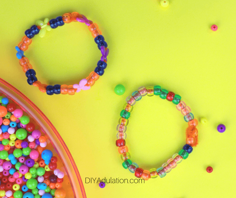 Beaded Pipe Cleaner Bracelets Next to Beads