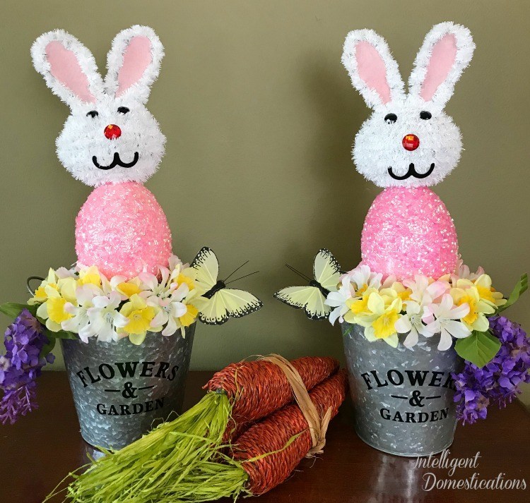 Bunny Pail Easter Decor next to decorative carrots