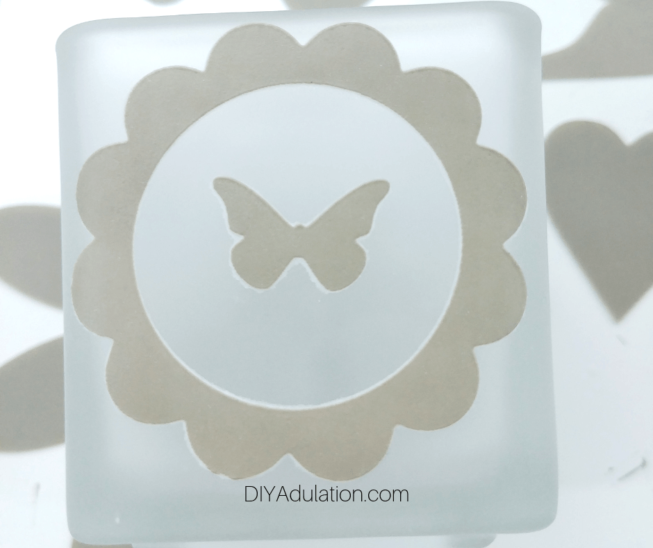 Butterfly inside of Scalloped Circle Stencil Mask