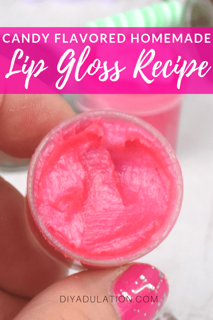 Close Up of Finger Holding Lip Gloss with text overlay - Candy Flavored Homemade Lip Gloss Recipe