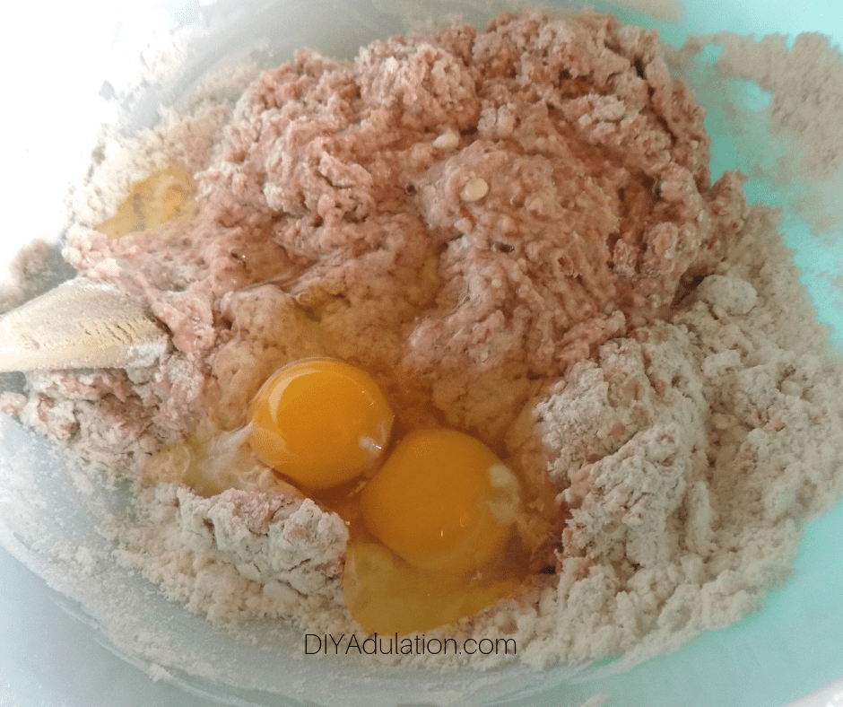 Eggs on Mixture in Glass Mixing Bowl