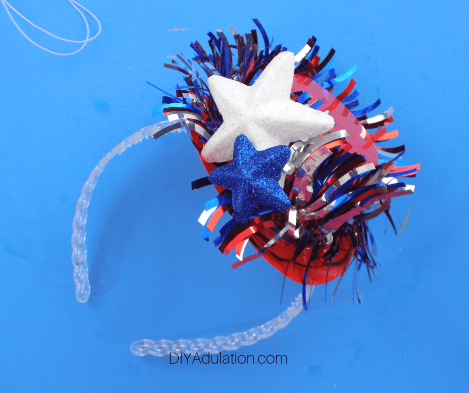 Glitter Stars and Patriotic Garland Glued on Red Mini Party Hat