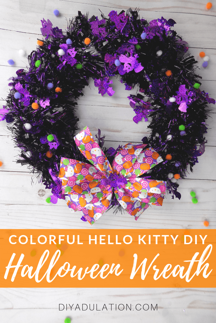 Halloween Wreath with Pom Poms with text overlay - Colorful Hello Kitty DIY Halloween Wreath