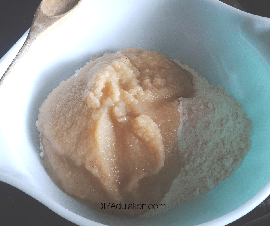 Pancake Mix and Applesauce in Glass Mixing Bowl