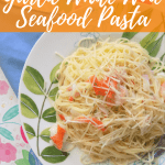 Plate of Pasta on Floral Background with text overlay - Simple and Delicious Garlic White Wine Seafood Pasta