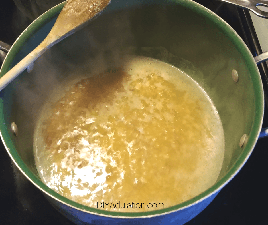 Simmering Onions, Garlic, and Melted Butter in Pot