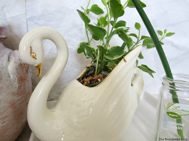 swan figurine planter