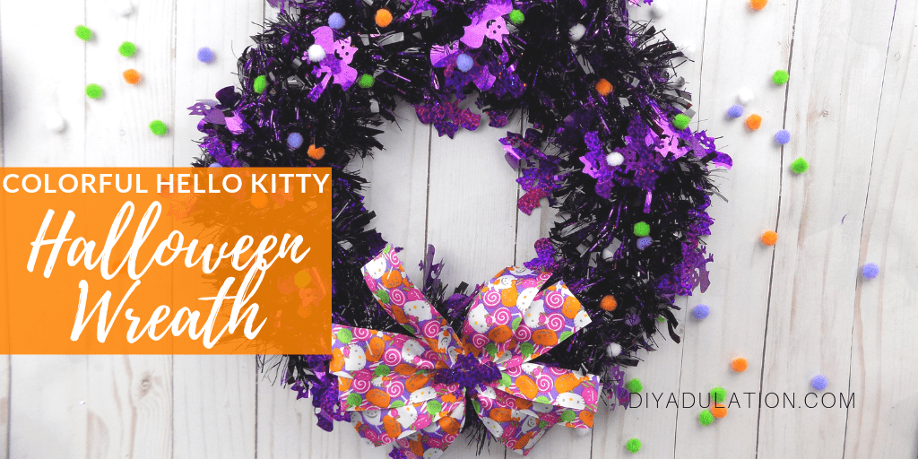Halloween Wreath with Pom Poms with text overlay - Colorful Hello Kitty DIY Halloween Wreath