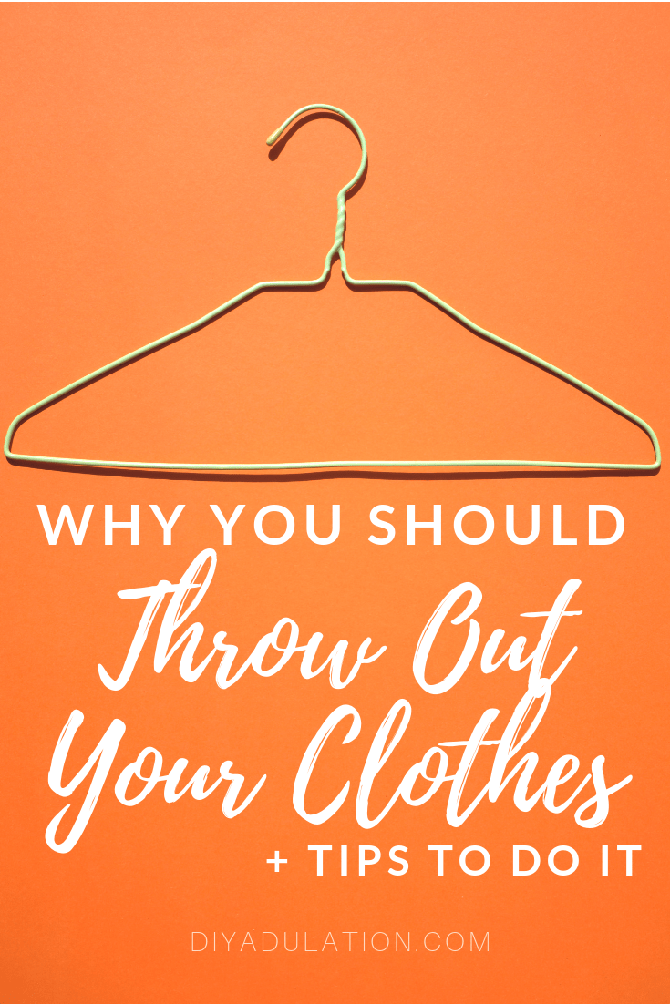 Empty Metal Hanger on Orange Background with text overlay - Why You Should Throw Out Your Clothes