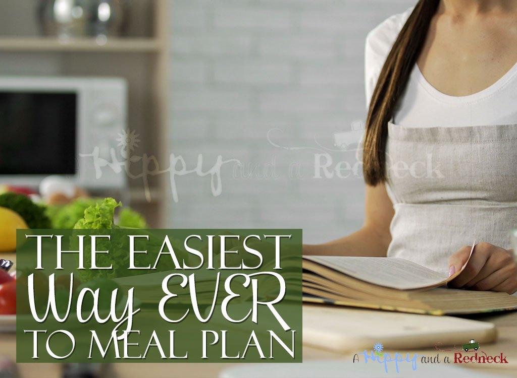 Woman looking at recipe book with text overlay - The Easiest way ever to meal plan
