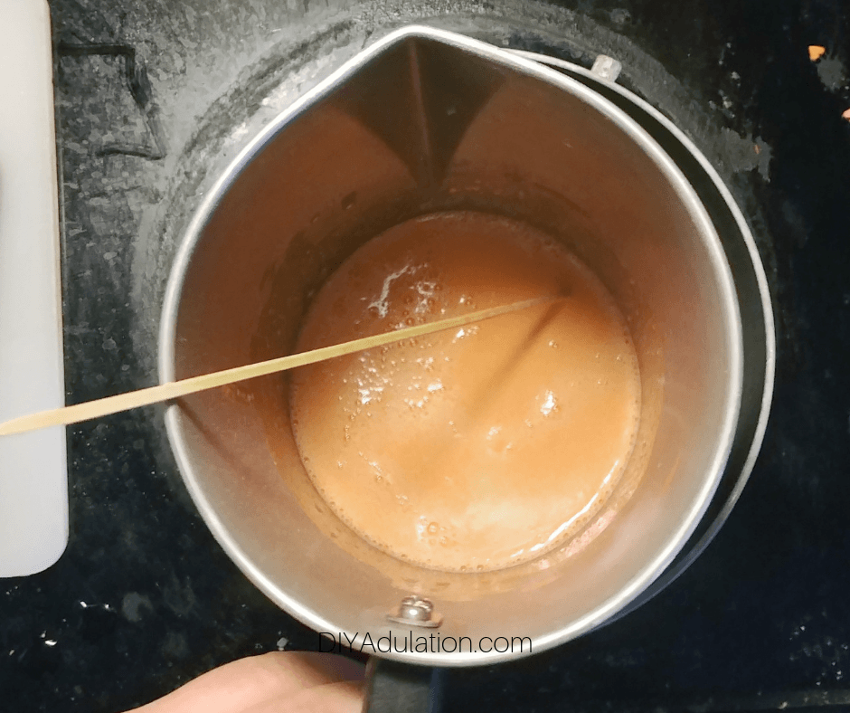 Orange Melted Soap in Pouring Pot