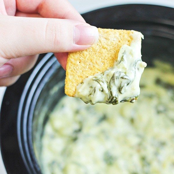 Slow Cooker Spinach and Artichoke Dip on Cracker