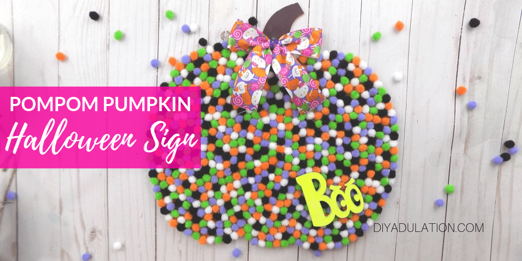 Pompom Pumpkin with bow with text overlay - Pompom Pumpkin Halloween Sign