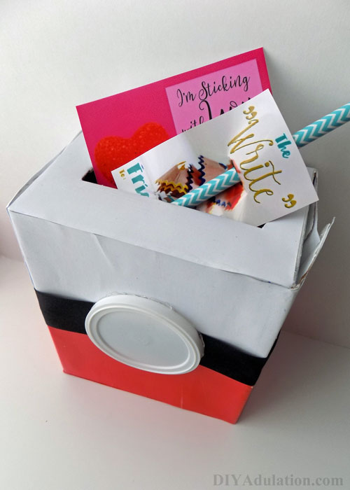 This recycled Pokeball Valentine box is made from items you already have laying around. Whip it up in time for your child's party.