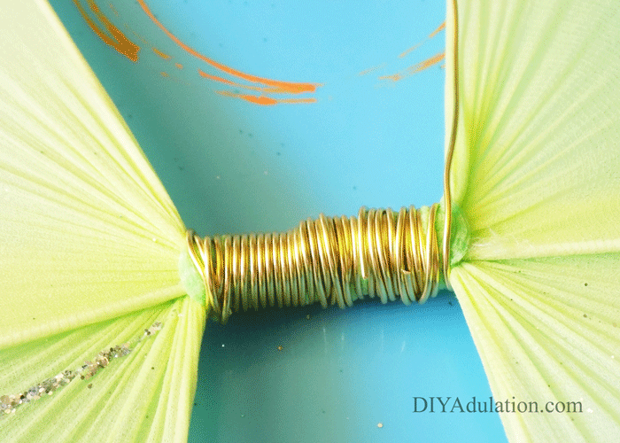 Gold Wire Wrapped around Center of Wings